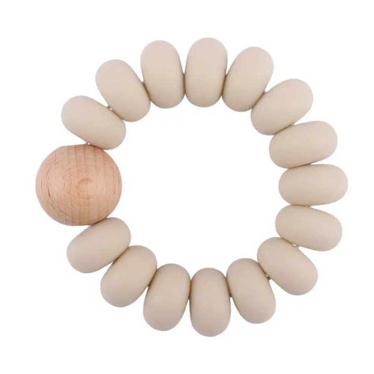 Bijtring Snufie – Een zachte, natuurlijk rubberen bijtring in een schattig ontwerp, speciaal ontwikkeld om gevoelig tandvlees te verzachten en doorkomende tandjes te kalmeren. Veilig, niet-giftig en perfect voor kleine babyhandjes.