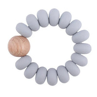 Bijtring Snufie – Een zachte, natuurlijk rubberen bijtring in een schattig ontwerp, speciaal ontwikkeld om gevoelig tandvlees te verzachten en doorkomende tandjes te kalmeren. Veilig, niet-giftig en perfect voor kleine babyhandjes.